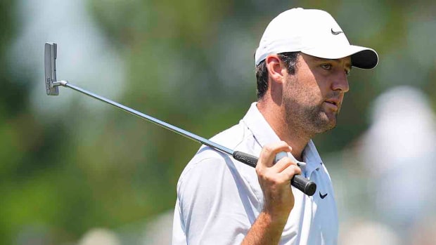 Scottie Scheffler reacts after missing a putt in the final round of the 2023 Memorial Tournament.